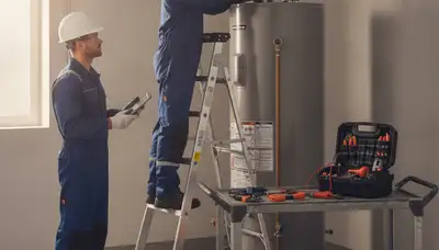 San Antonio plumber repairing a water heater for a home service call